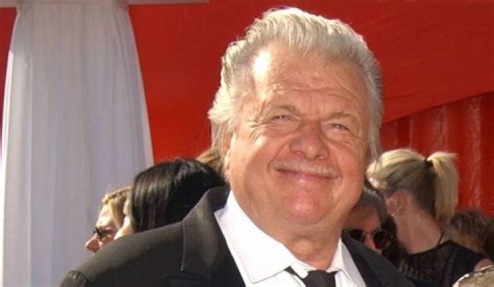 How old is john karlen?